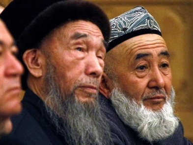 China bans beards, veils from Xinjiang city's buses in security bid
