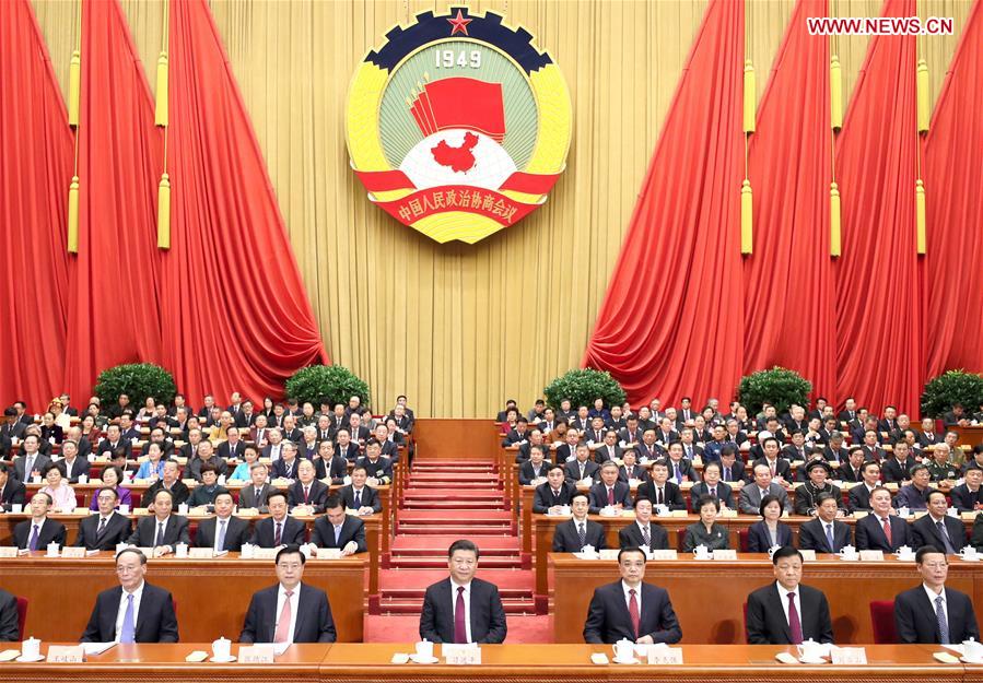 Xi Jinping (3rd L, front), Li Keqiang (3rd R, front), Zhang Dejiang (2nd L, front), Liu Yunshan (2nd R, front), Wang Qishan (1st L, front) and Zhang Gaoli (1st R, front) attend the opening meeting of the fifth session of the 12th National Committee of the Chinese People's Political Consultative Conference at the Great Hall of the People in Beijing, capital of China, March 3, 2017. Photo: Xinhua