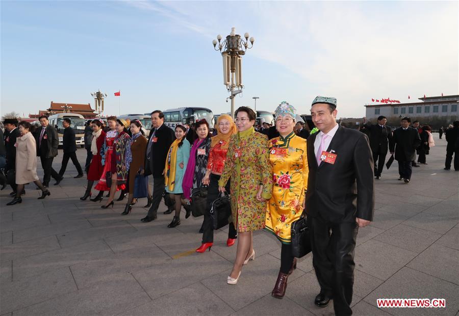 Deputies to China's 12th National People's Congress (NPC) walk to the Great Hall of the People in Beijing, capital of China, March 5, 2017. The fifth session of the 12th NPC opened in Beijing on March 5. Photo: Xinhua