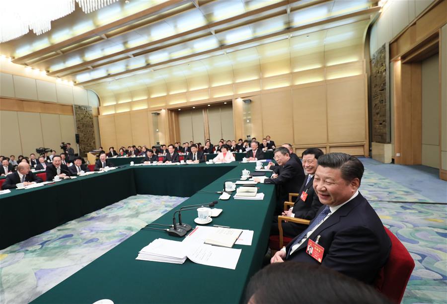 Chinese President Xi Jinping joins a panel discussion with deputies to the 12th National People's Congress (NPC) from Shanghai Municipality at the annual session of the NPC in Beijing, capital of China, March 5, 2017. Photo: Xinhua