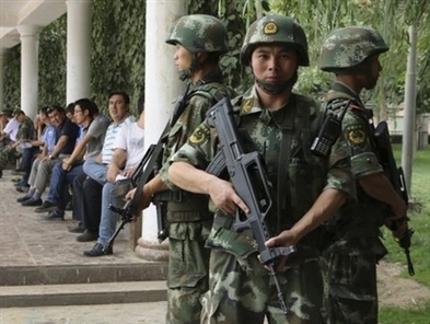 China detains Xinjiang man for 'online rumours'