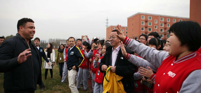 Ronaldo opens football school in Beijing