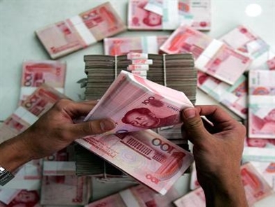 China's forex reserves fall by record $93.9 billion on yuan intervention