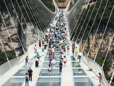 China opens record-breaking glass bridge