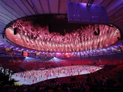 Summer Olympics begin with uplifting spectacle in gritty Rio